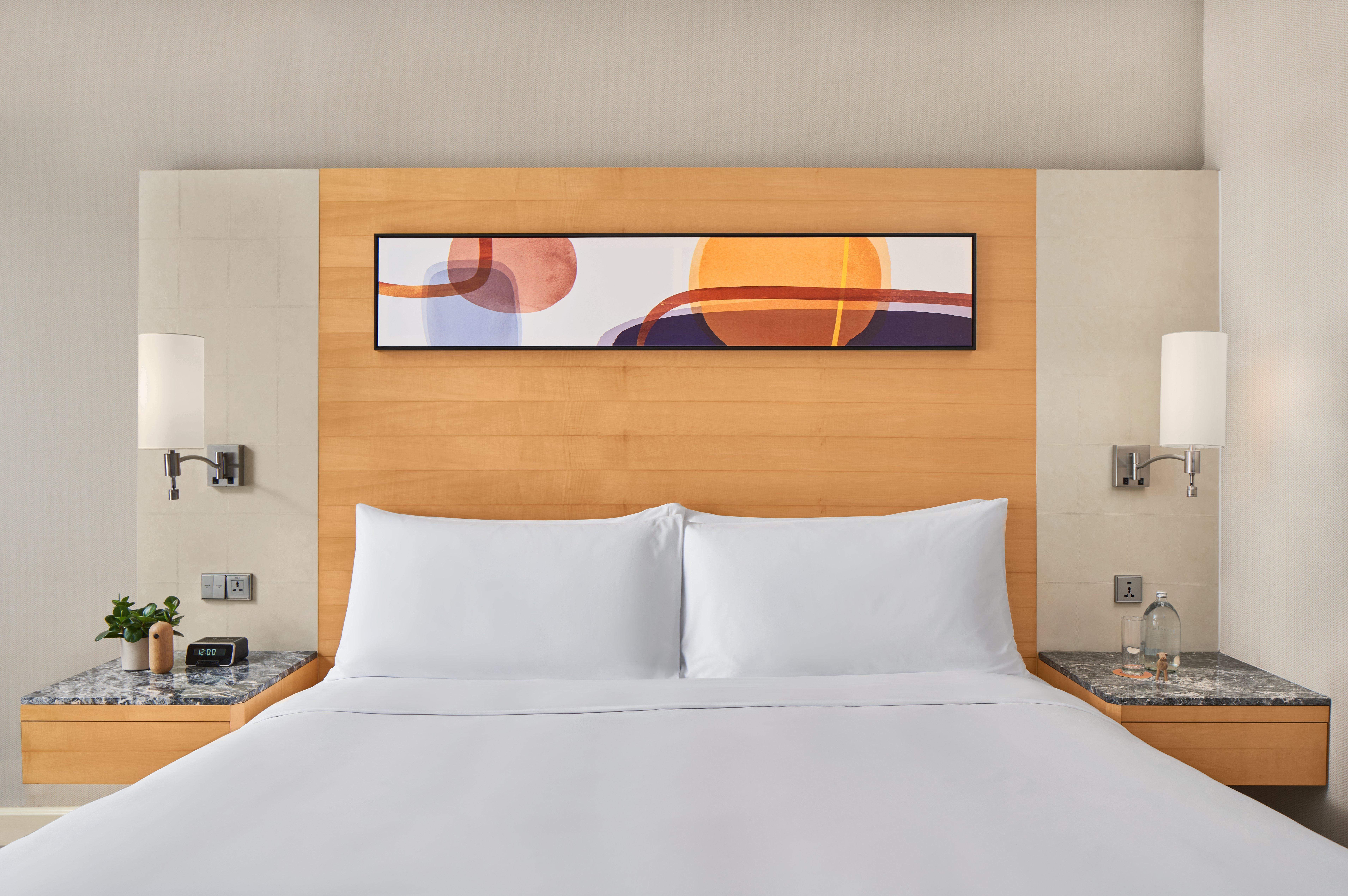 voco Orchard Singapur Exterior foto A bedroom at the Hilton London Heathrow